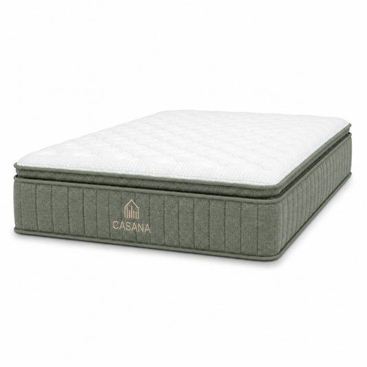 A Casana mattress with a white quilted top and a green side, featuring the Casana brand logo embroidered in gold on the side, set against a plain white background.