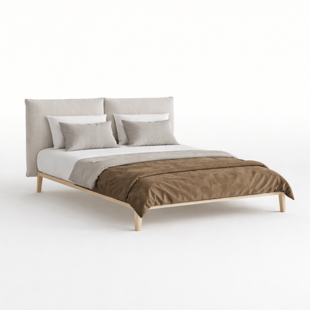 Bed with beige headboard, white bedding, and brown blanket on a white background
