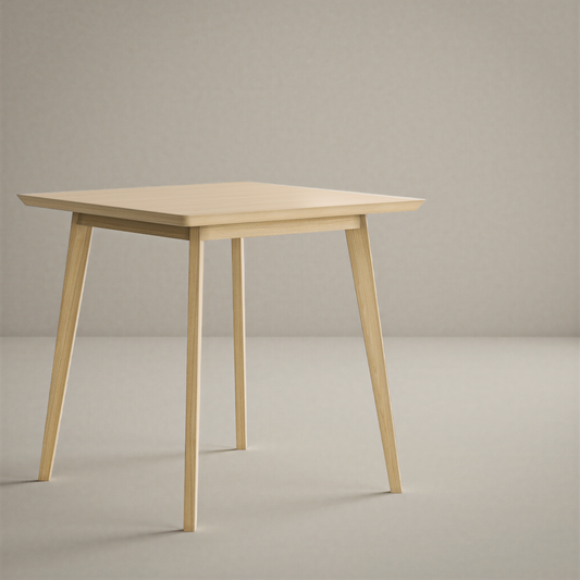 Light oak small dining table on a white background.
