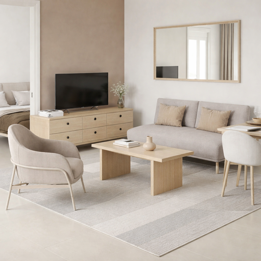 Modern living room with beige sofa, wooden coffee table, and neutral decor.