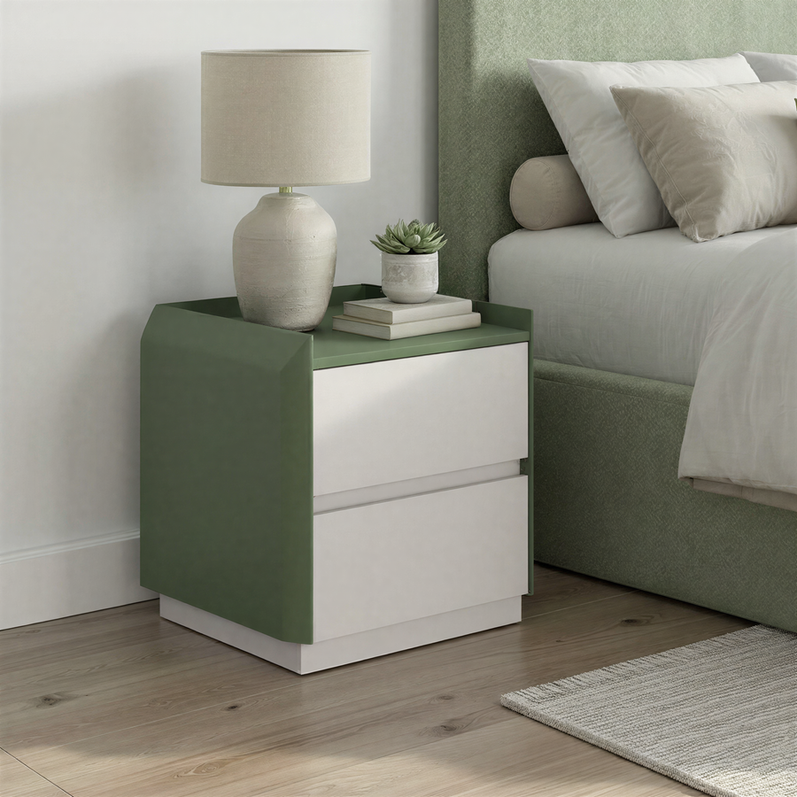 Green and white nightstand with books and a plant in a bedroom setting