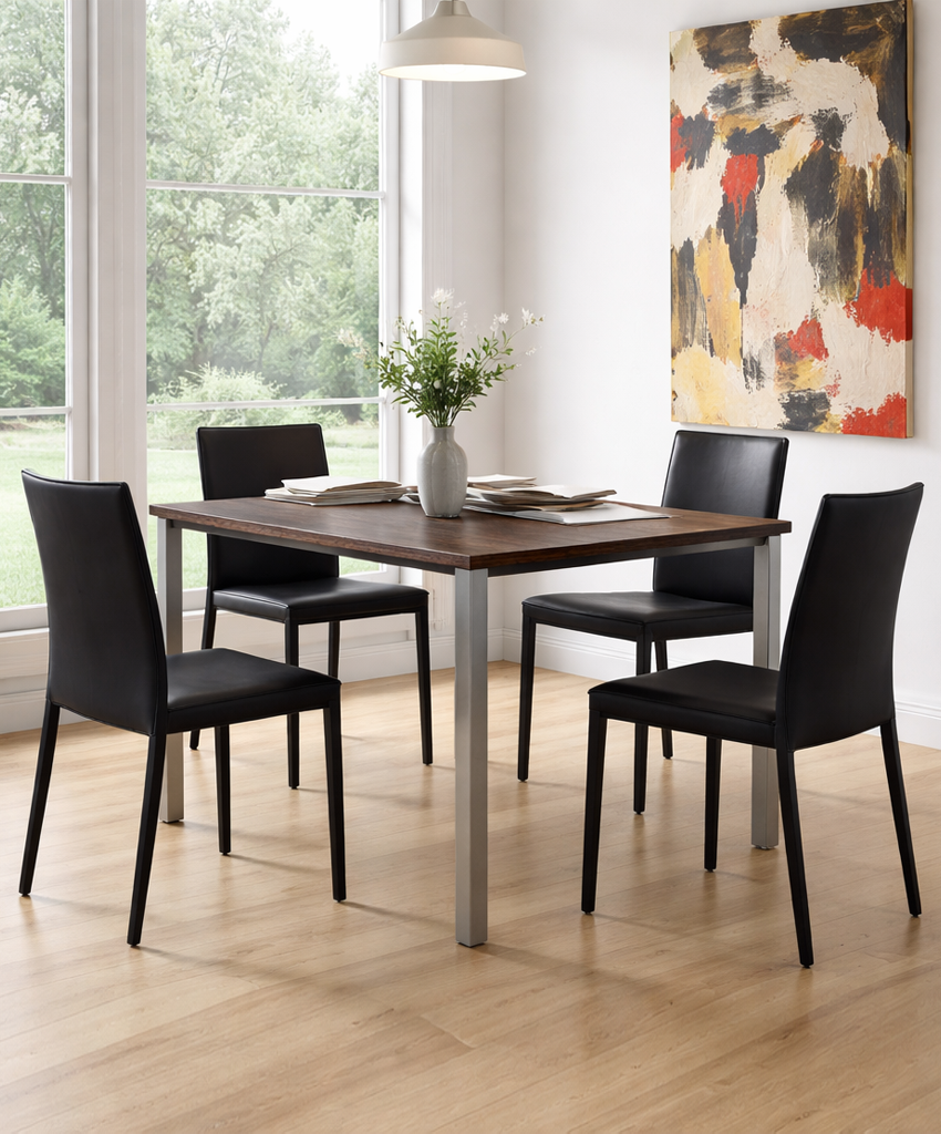 Dining room with a wooden table and black chairs, featuring a large window and abstract art on the wall.