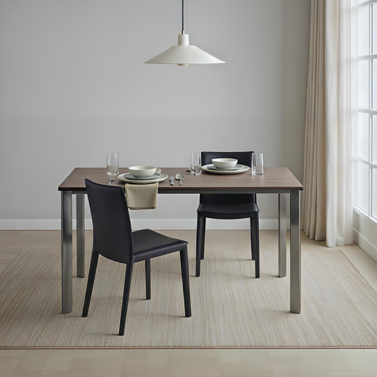 Dining table set with chairs in a room with a light grey wall and large window.