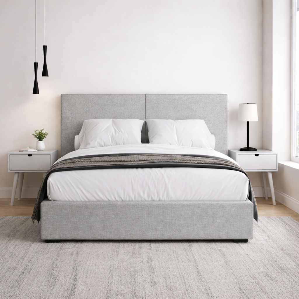Grey double bed and complimentary nightstands in a modern bedroom.