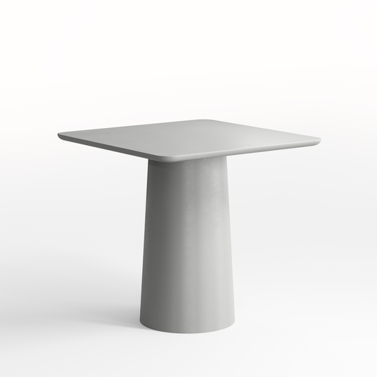 grey dining table with cylindrical base on a white background