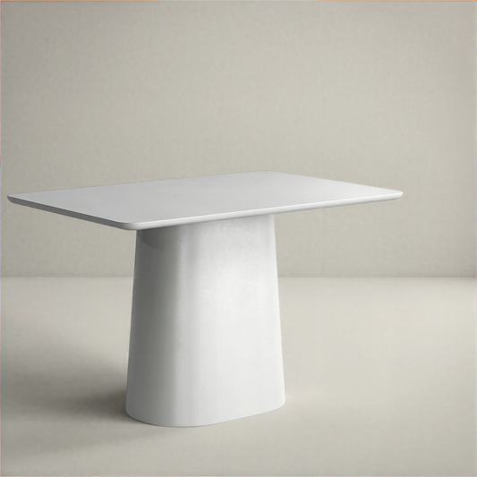 Modern grey dining table with a cylindrical base on a plain background